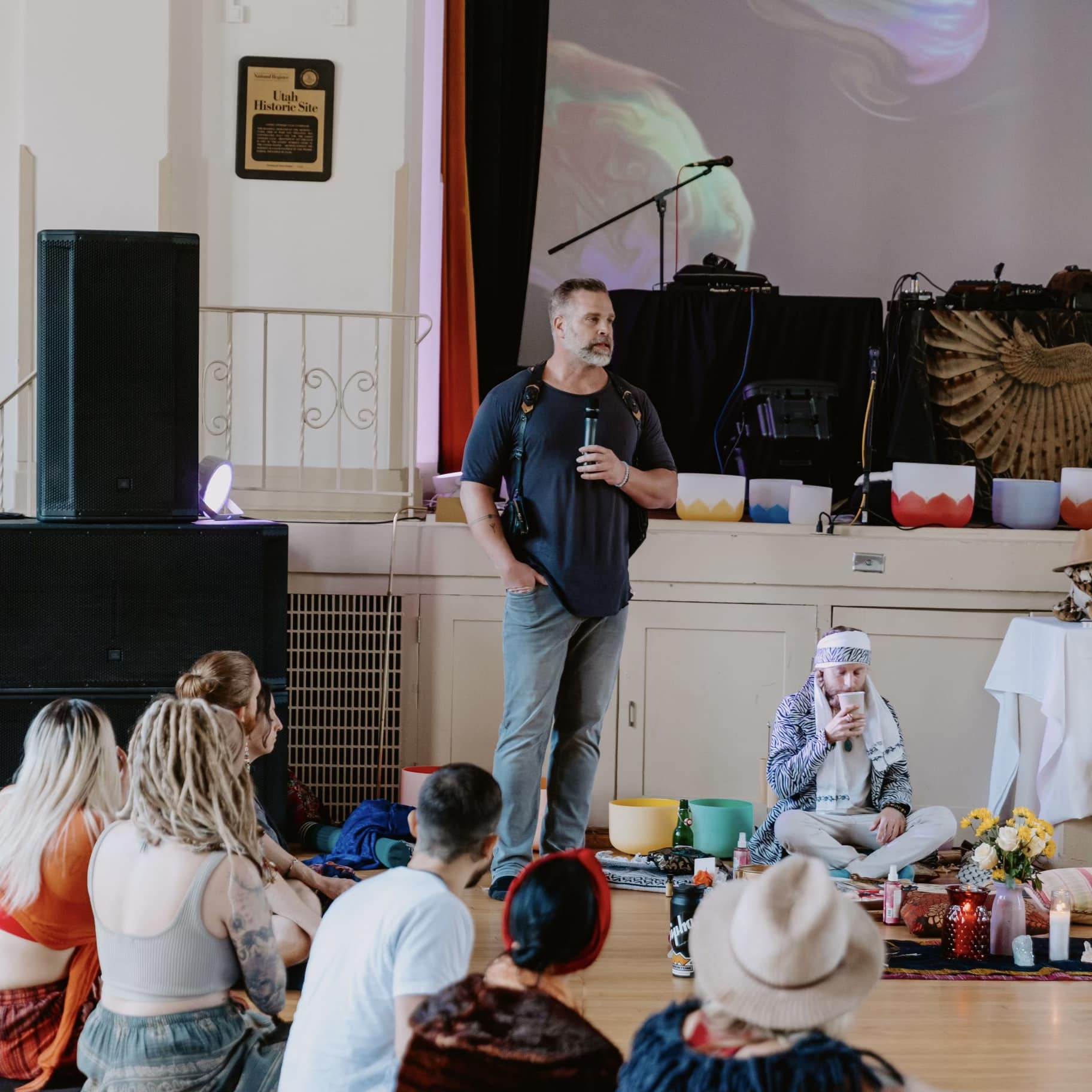 Speaking to a group of men